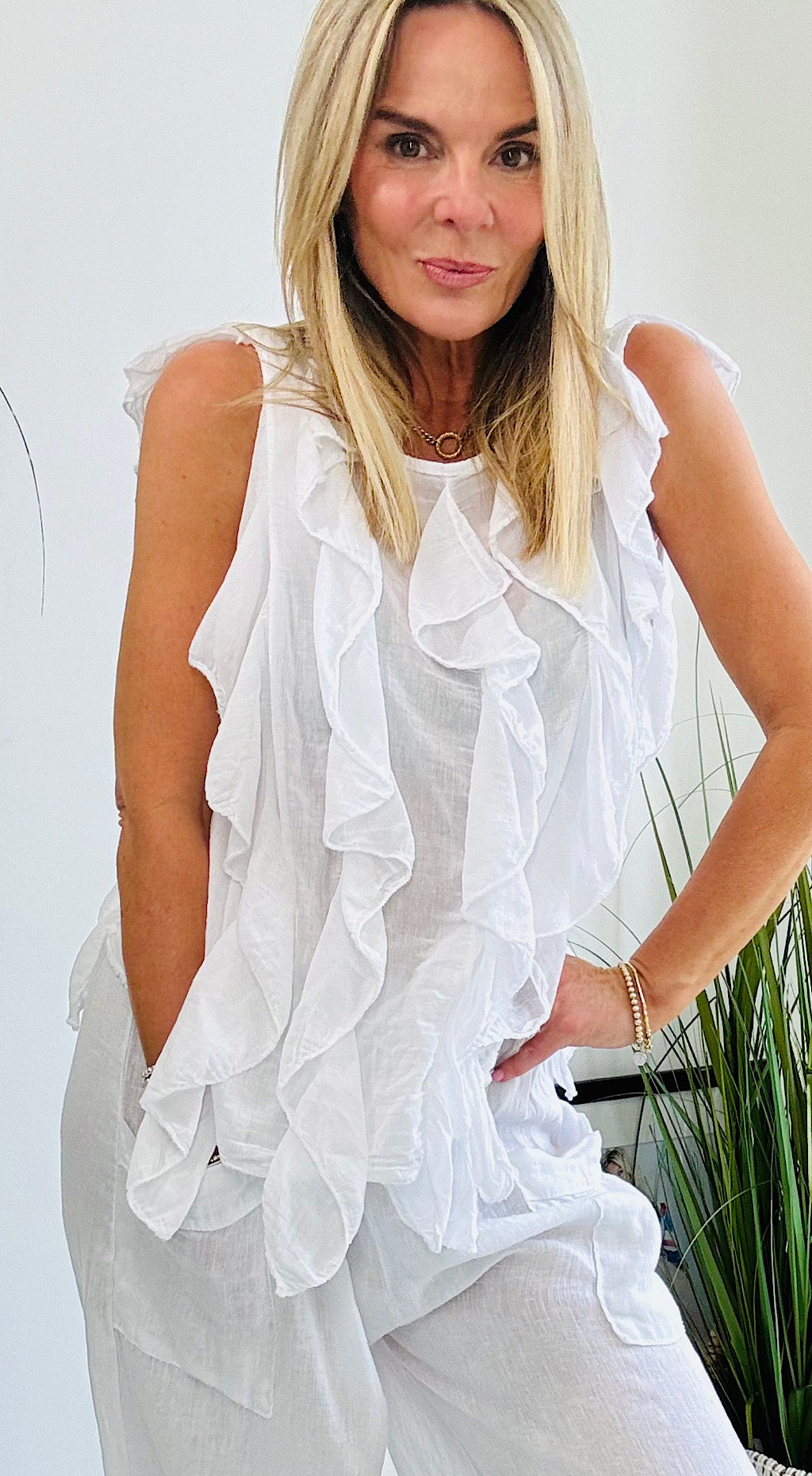 White ruffle top