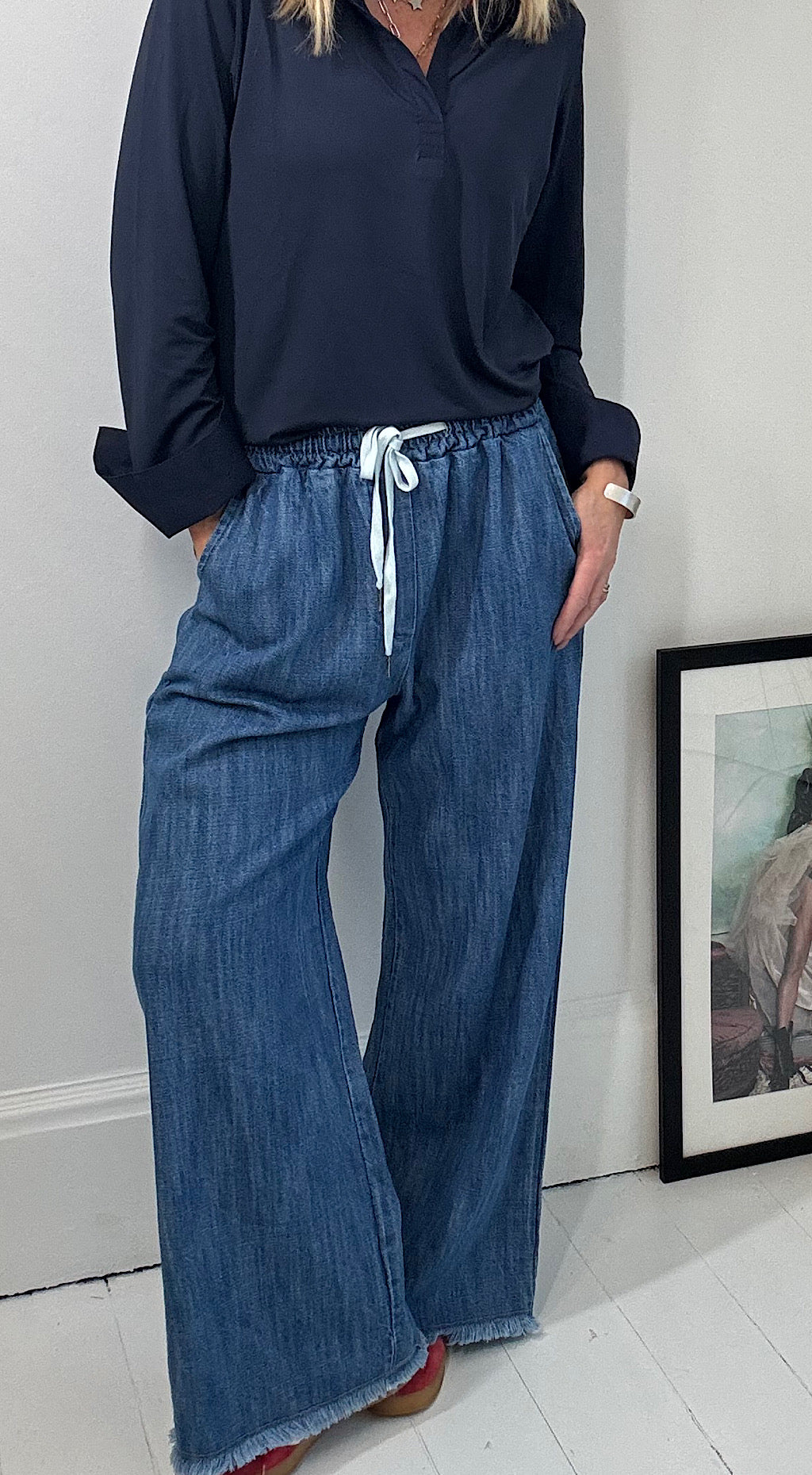 Frayed bottom denim pants