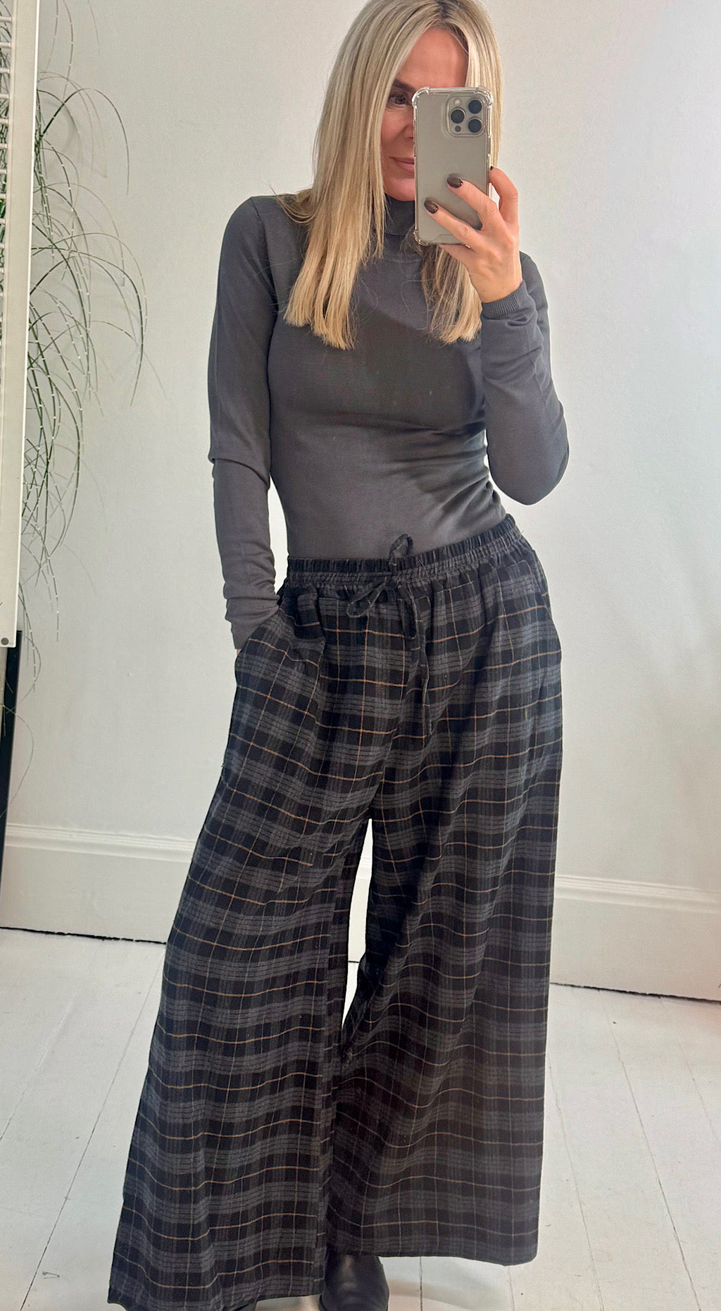 Flared check pants